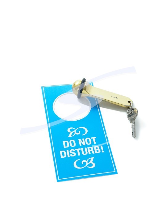 Hotel key and do not disturb sign