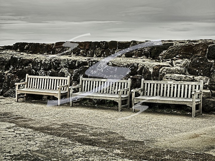 Three empty benches