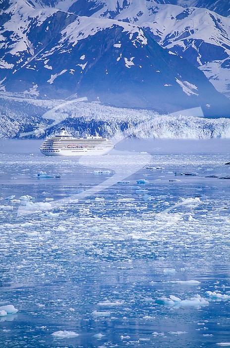 USA, Alaska, Glacier Bay with cruise ship amongst floating ice.. USA, Alaska, Glacier Bay with cruise ship amongst flaoting ice.