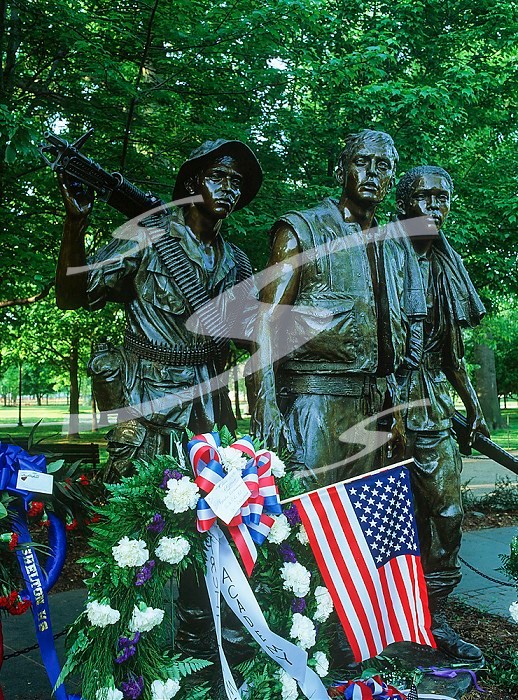 USA, Washington, DC - Vietnam Monument with floral wreath and flag