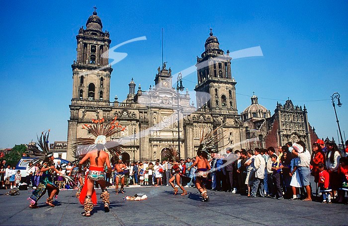 Mexico City, Zocalo, traditional aztec dancers at Metropolitan Cathedral