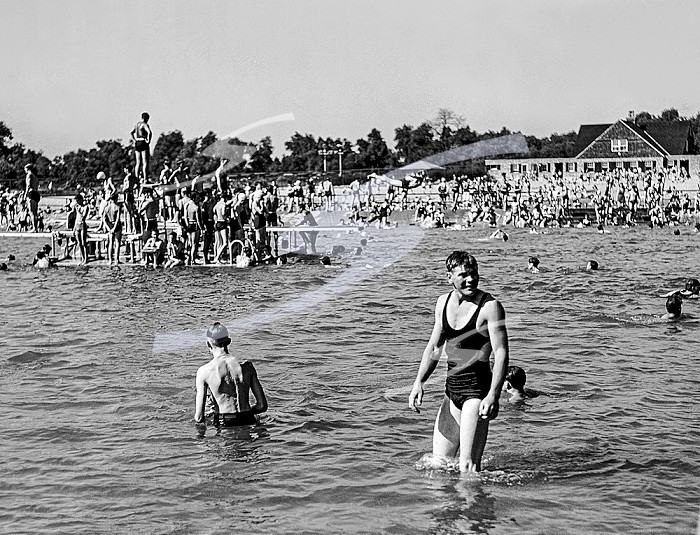 Chicago, Illinois c 1930, A crowd of people at the swimming pool in Cermak Park in Chicago.. The Pool At Cermak Park