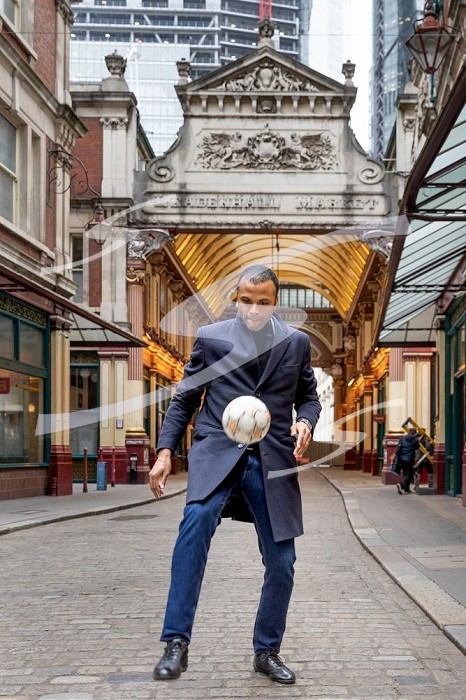 London, England, UK, 24 January 2022 - Portrait of Maheta Molango, CEO of the Professional Footballers’ Associaton (PFA) since July 2021, with a football on the street in the City of London.. Portrait of Maheta Molango