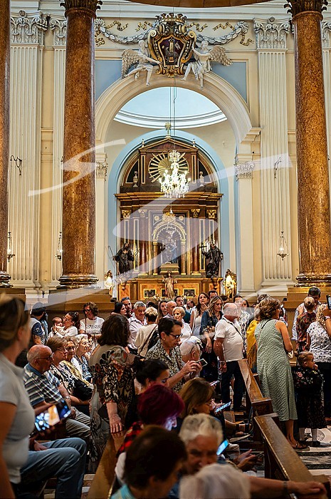 Believers inside the Cathedral-Basilica of Our Lady of the Pillar during The Offering of Flowers to the Virgen del Pilar, the most important and popular event of the Fiestas del Pilar held on Hispanic Day, Zaragoza, Spain