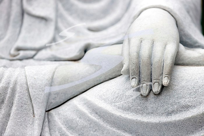 Tinh That Quan Am Pagoda. Bodhisattva Avalokiteshvara. Guanyin ( Quan Am) Statue. The Goddess of Mercy and compassion. Marble statue. Close up on hand. Dalat. Vietnam. 