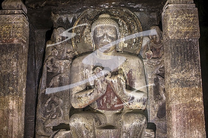 Ajanta caves, a UNESCO World Heritage Site in Maharashtra, India. Cave 16. Statue of Seated Buddha in teaching asana.