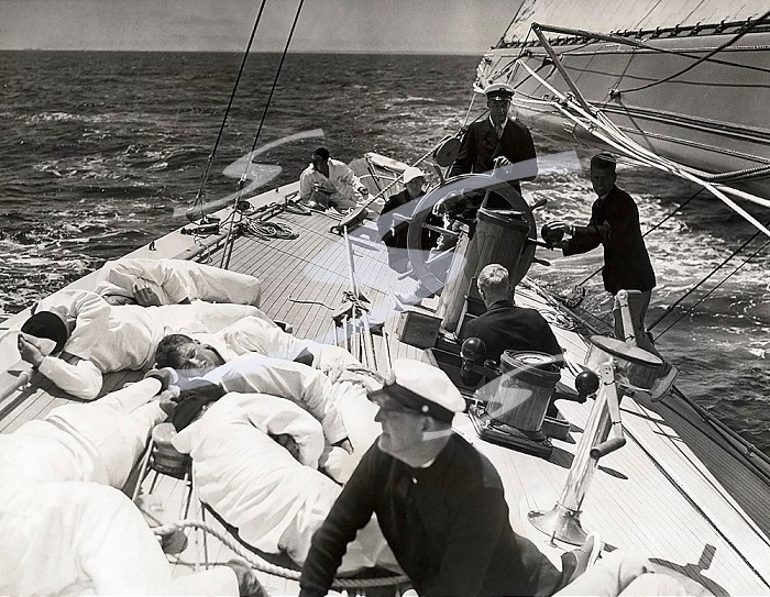 Newport, Rhode Island June 18, 1937 It is a case of duck or get a bump on your noggin if you are in the path of the boom when it swings aboard the yacht 