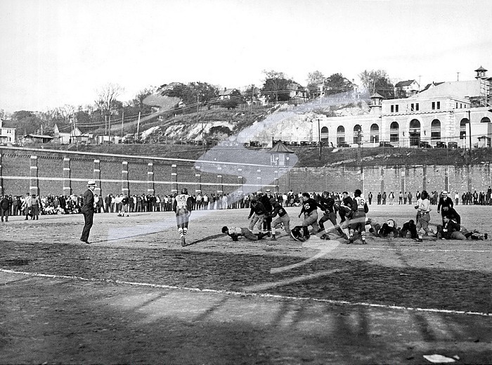 Ossining, New York: c. 1931 The Sing Sing Prison football teams practicing before taking on the Port Jervis Police Department football team in a game to be played at the prison yard before the public and inmates.. Sing Sing Football Practice