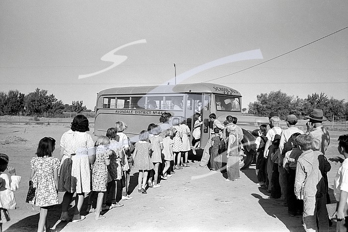 Children of migratory laborers who are living at migratory labor camp boarding school bus, Agua Fria, Arizona, USA, Russell Lee, U.S. Farm Security Administration, March 1940. . Children of migratory laborers who are living at migratory labor camp boarding school bus, Agua Fria, Arizona, USA, Russell Lee, U.S. Farm Security Administration, March 1940